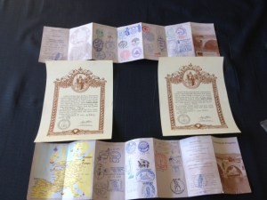 Our pilgrims passports, stamped with all the places we stayed, and  our Compestellas, for accomplishing the Camino